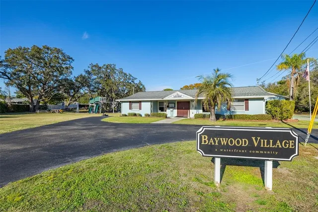 a view of front of a house with a swimming pool