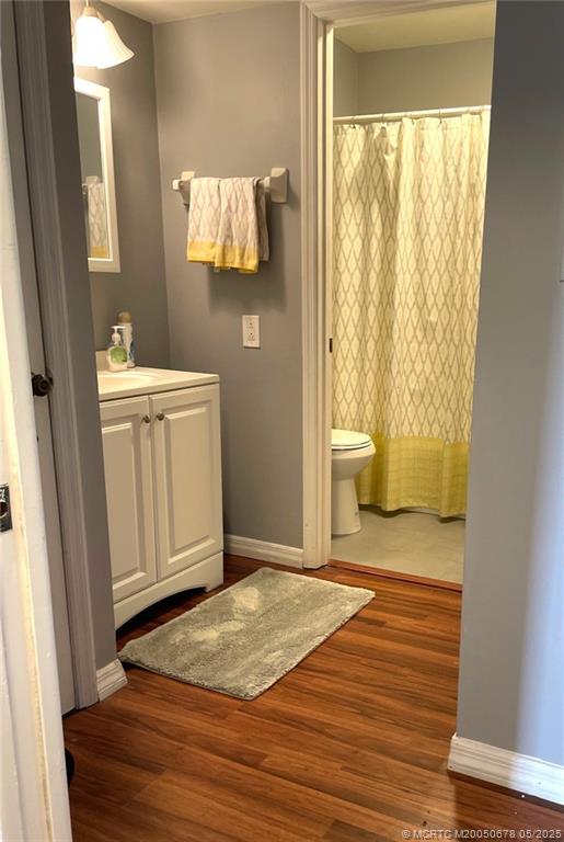 801 Southeast Central Parkway, Unit 8019 Stuart, FL 34994 - Photo 31 of 41 a bedroom with a bed and a window