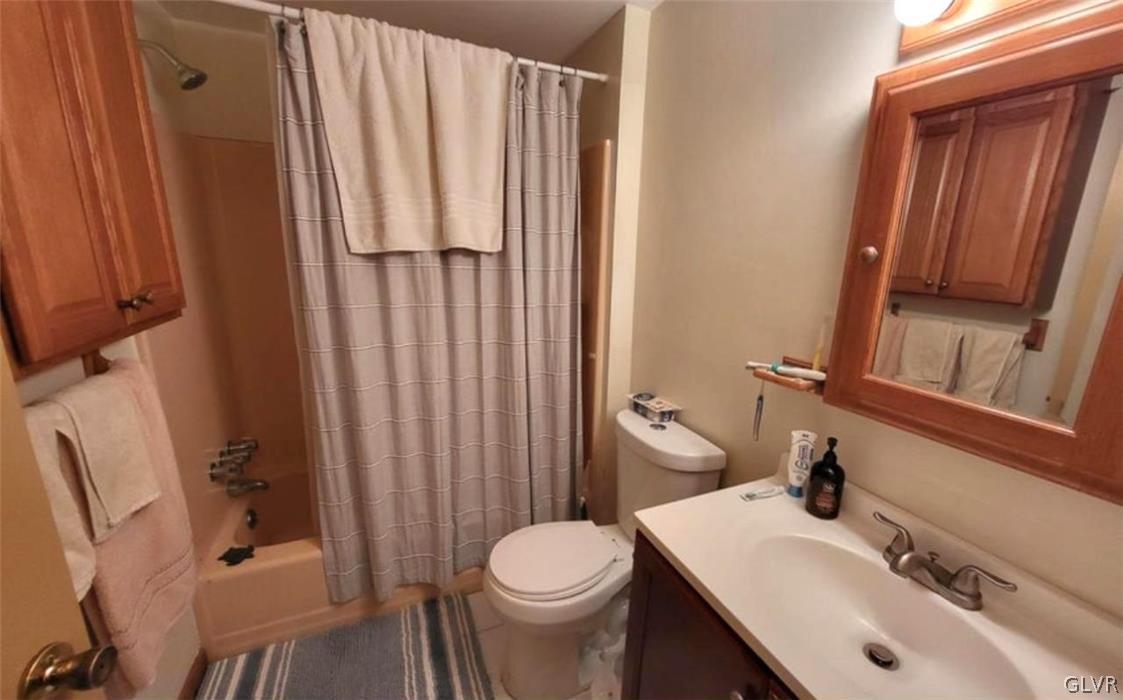 239 Saunders Drive Bushkill, PA 18324 - Photo 16 of 26 a bathroom with a sink toilet and shower