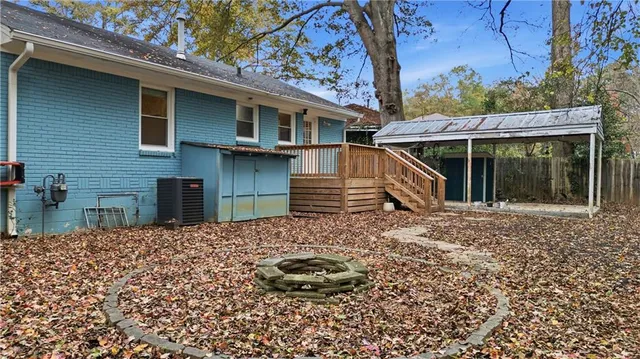 a backyard of a house with seating space