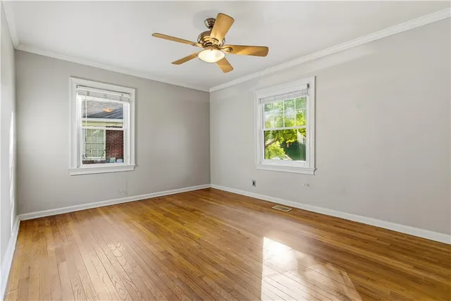 a view of an empty room and window