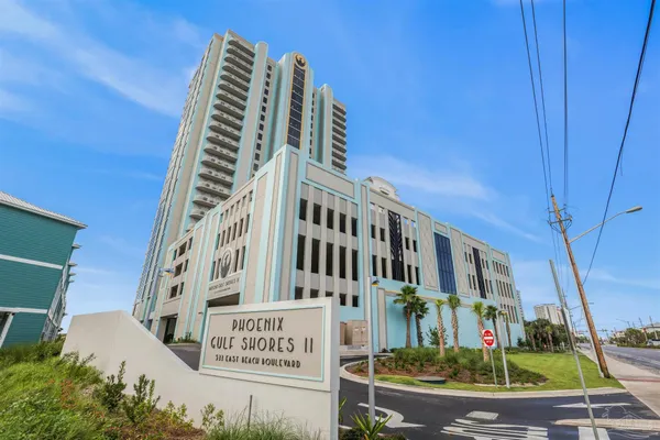 a view of a building with backyard