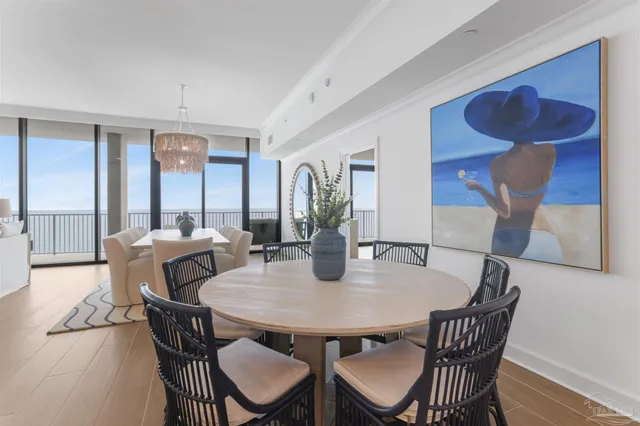 a bedroom with a large bed and a large window