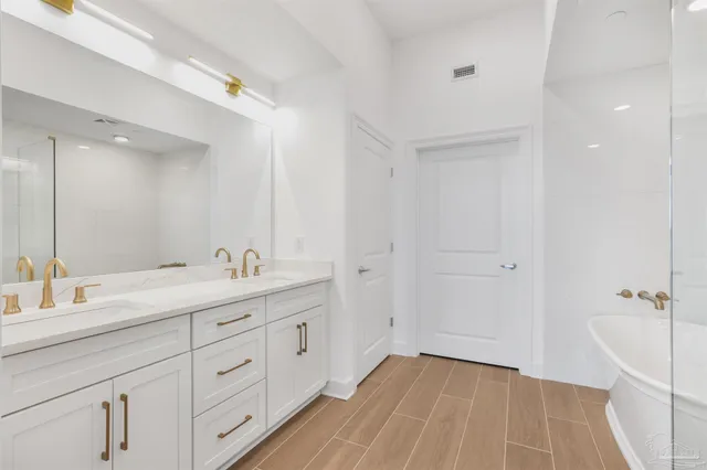 a bedroom with bed and window