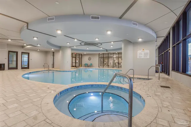 a view of swimming pool with outdoor space and seating area