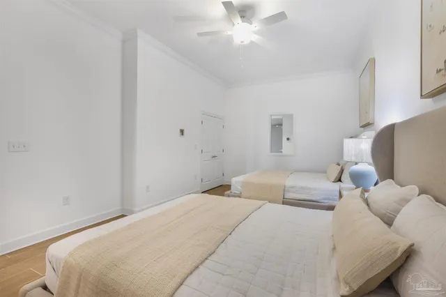 a view of a kitchen with a sink wooden floor and a window