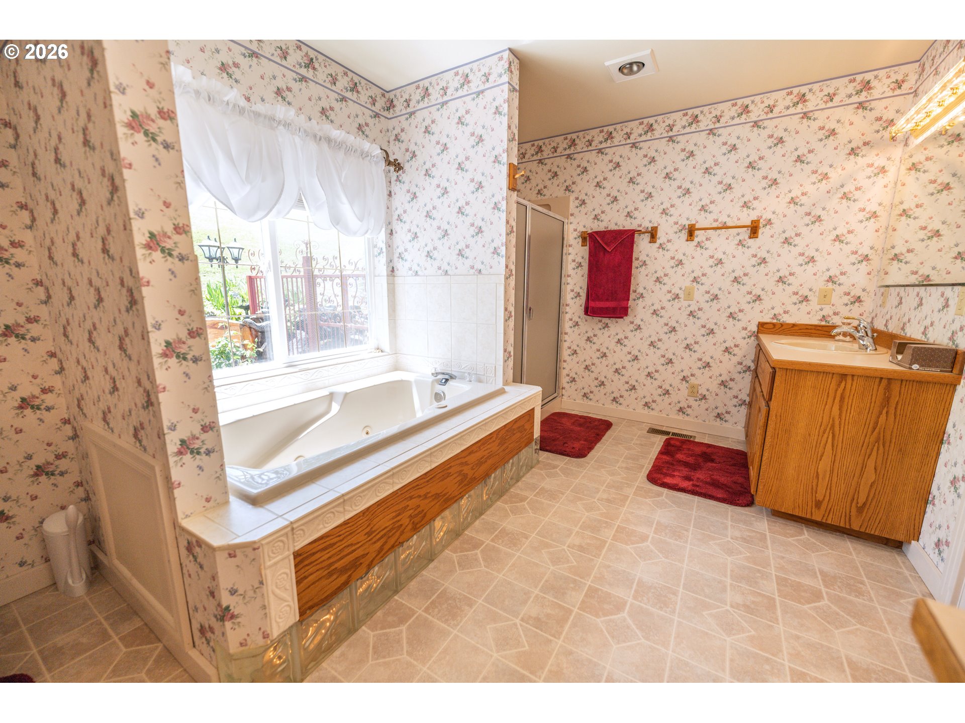 489 Fir Vista Road Sutherlin, OR 97479 - Photo 16 of 47 a bathroom with a tub sink and mirror
