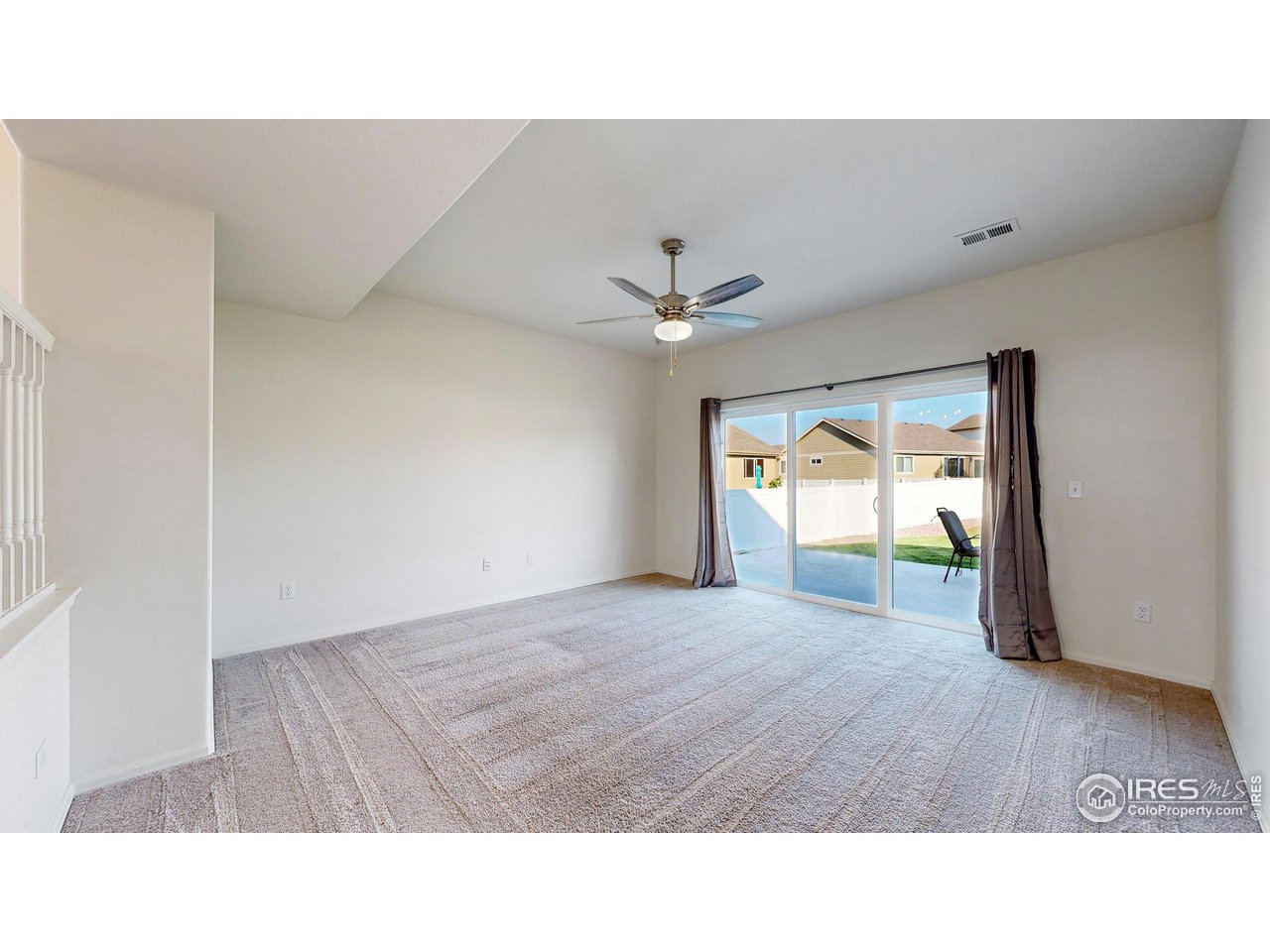 684 Takin Drive Severance, CO 80550 - Photo 12 of 38 a open hall with a hardwood floor and a ceiling fan