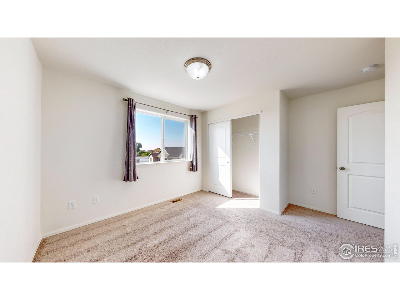 684 Takin Drive Severance, CO 80550 - Photo 15 of 38 a bathroom with a sink and mirror