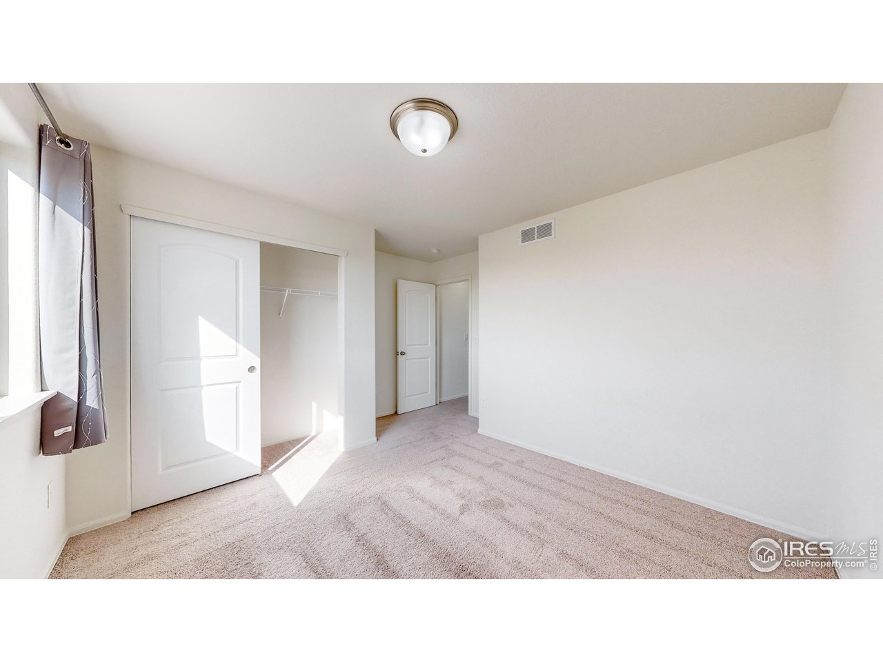 684 Takin Drive Severance, CO 80550 - Photo 16 of 38 a bathroom with a sink and a mirror