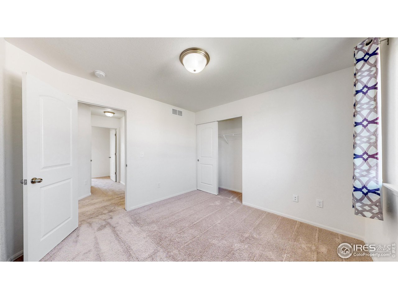684 Takin Drive Severance, CO 80550 - Photo 18 of 38 a bathroom with a sink and a mirror