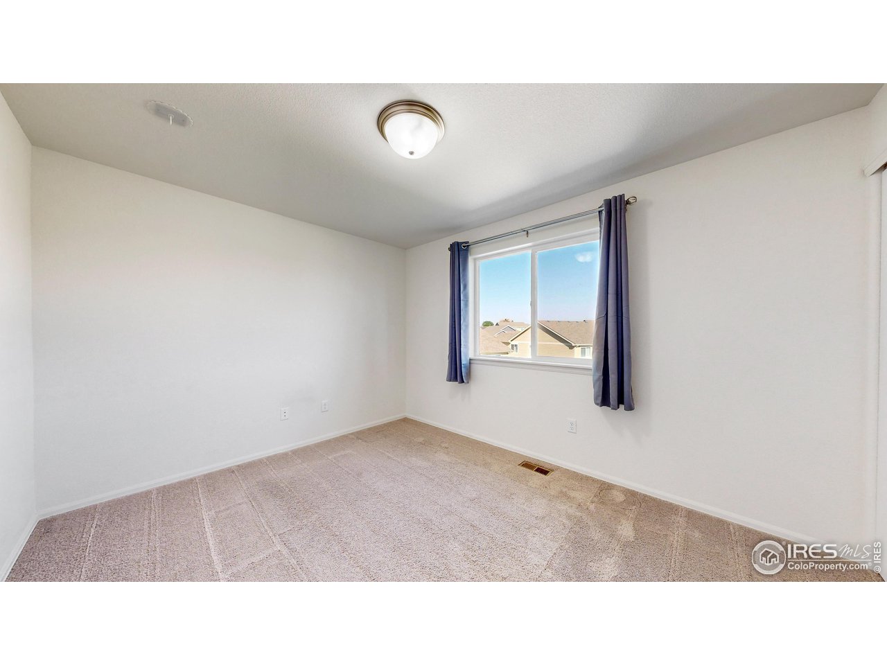 684 Takin Drive Severance, CO 80550 - Photo 19 of 38 a open hall with a bench