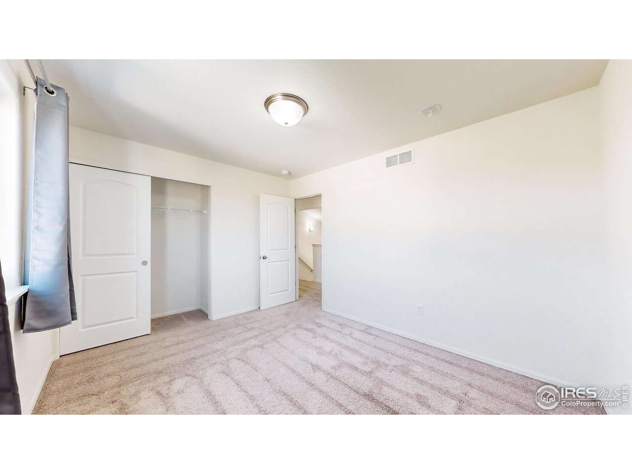 684 Takin Drive Severance, CO 80550 - Photo 20 of 38 a bathroom with a sink and a mirror