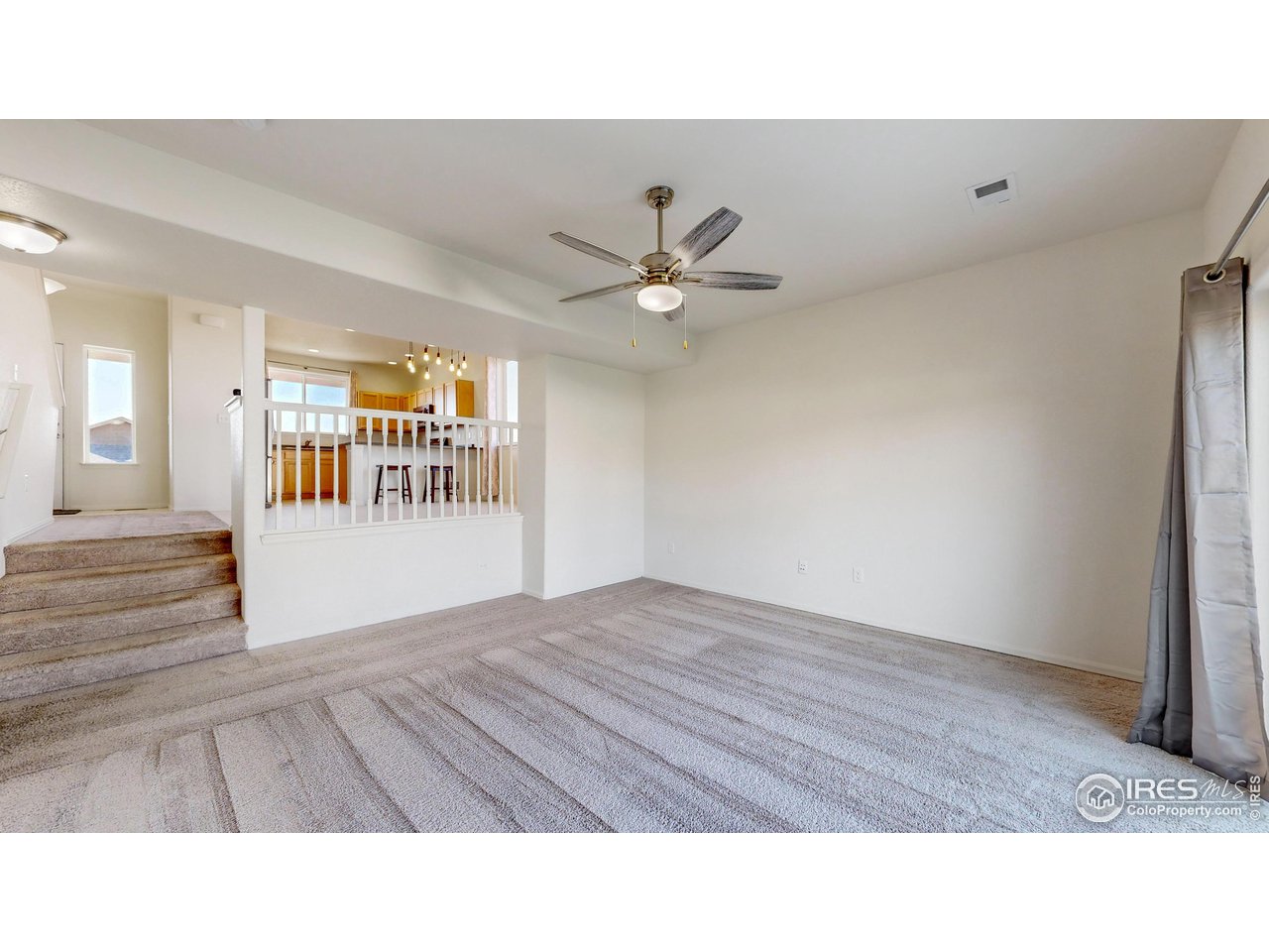 684 Takin Drive Severance, CO 80550 - Photo 10 of 38 a black and white photo of a living room