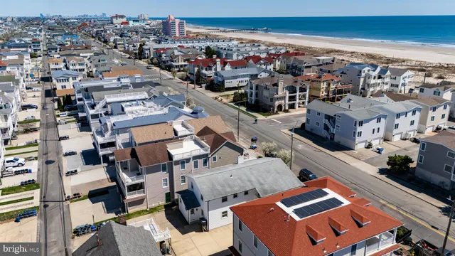 an aerial view of a city with lots of residential buildings