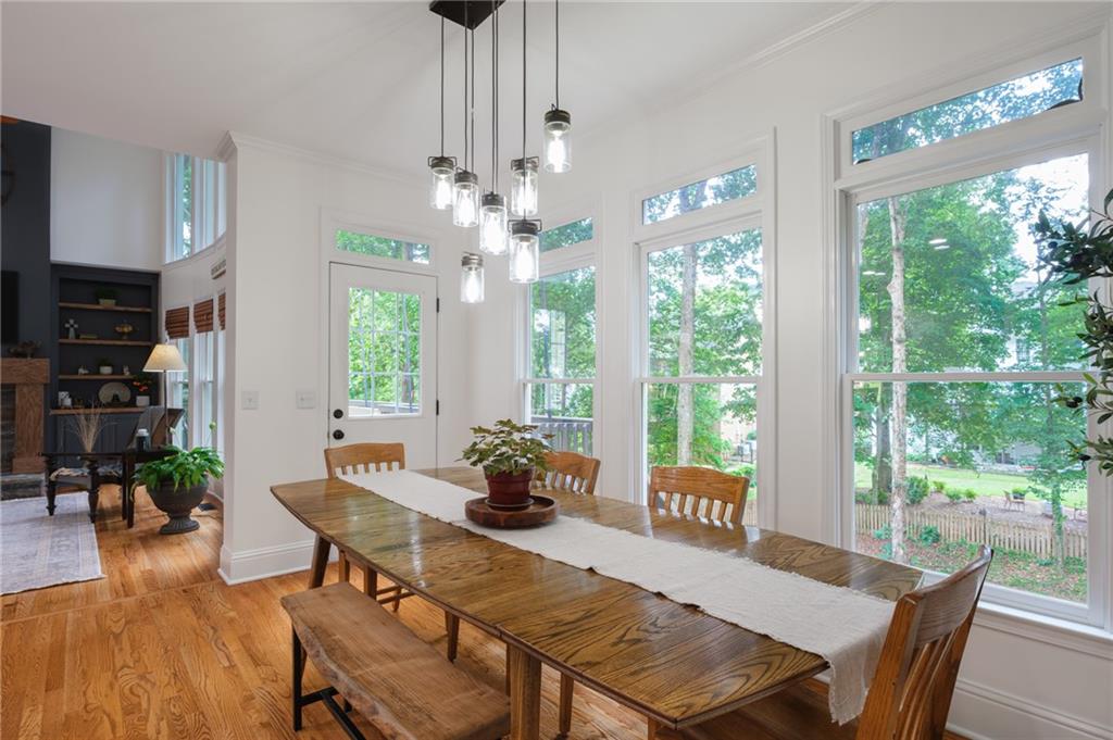4330 Farmbrook Lane Cumming, GA 30041 - Photo 12 of 46 a view of a dining room with furniture window and outside view