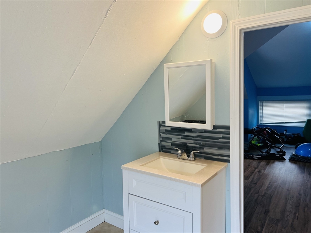 249 Chatham Street Lynn, MA 01902 - Photo 20 of 42 a view of a kitchen from a hallway