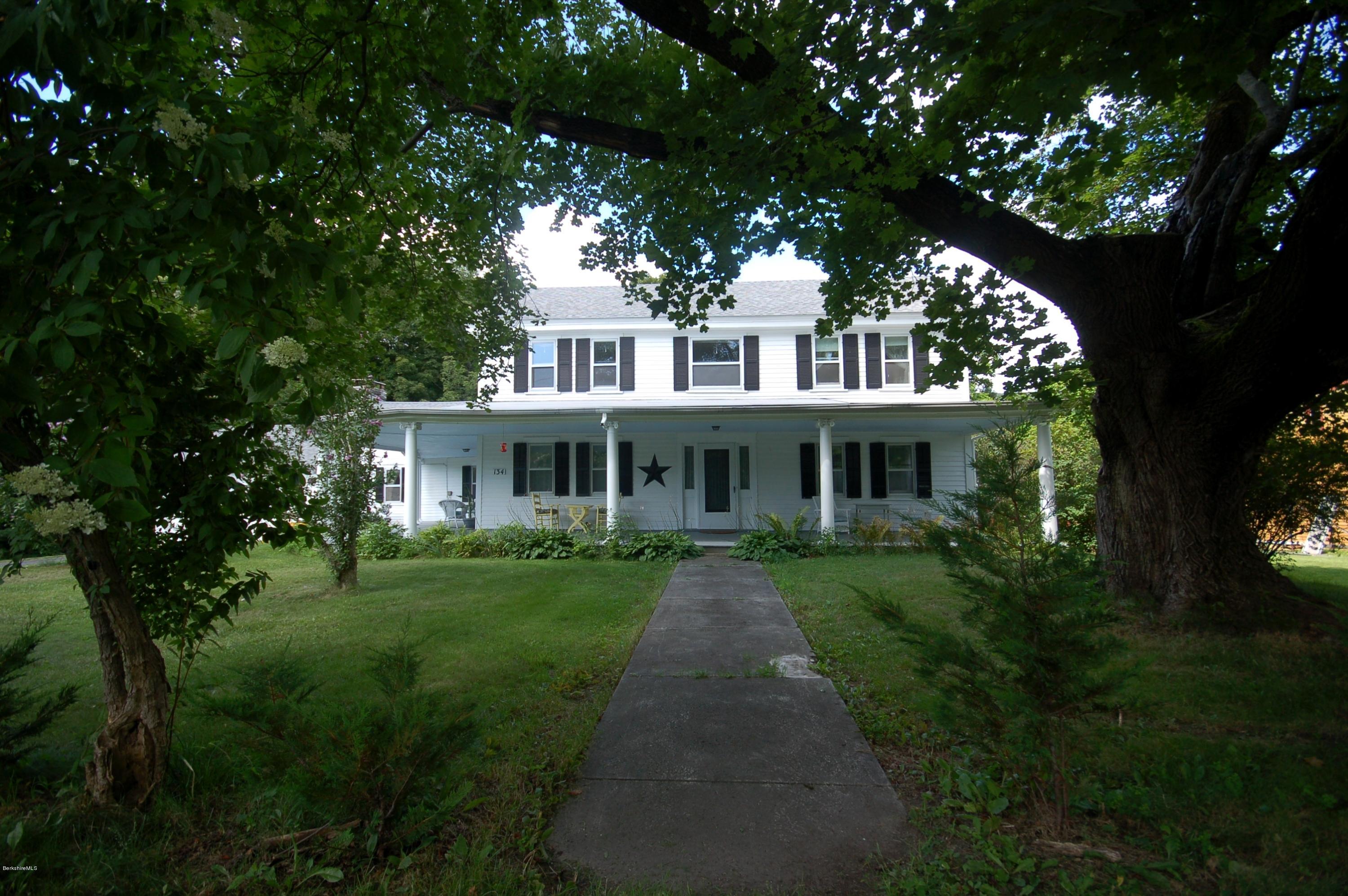 134 West Center Road West Stockbridge, MA 01266 - Photo 1 of 28 a front view of a house with a garden