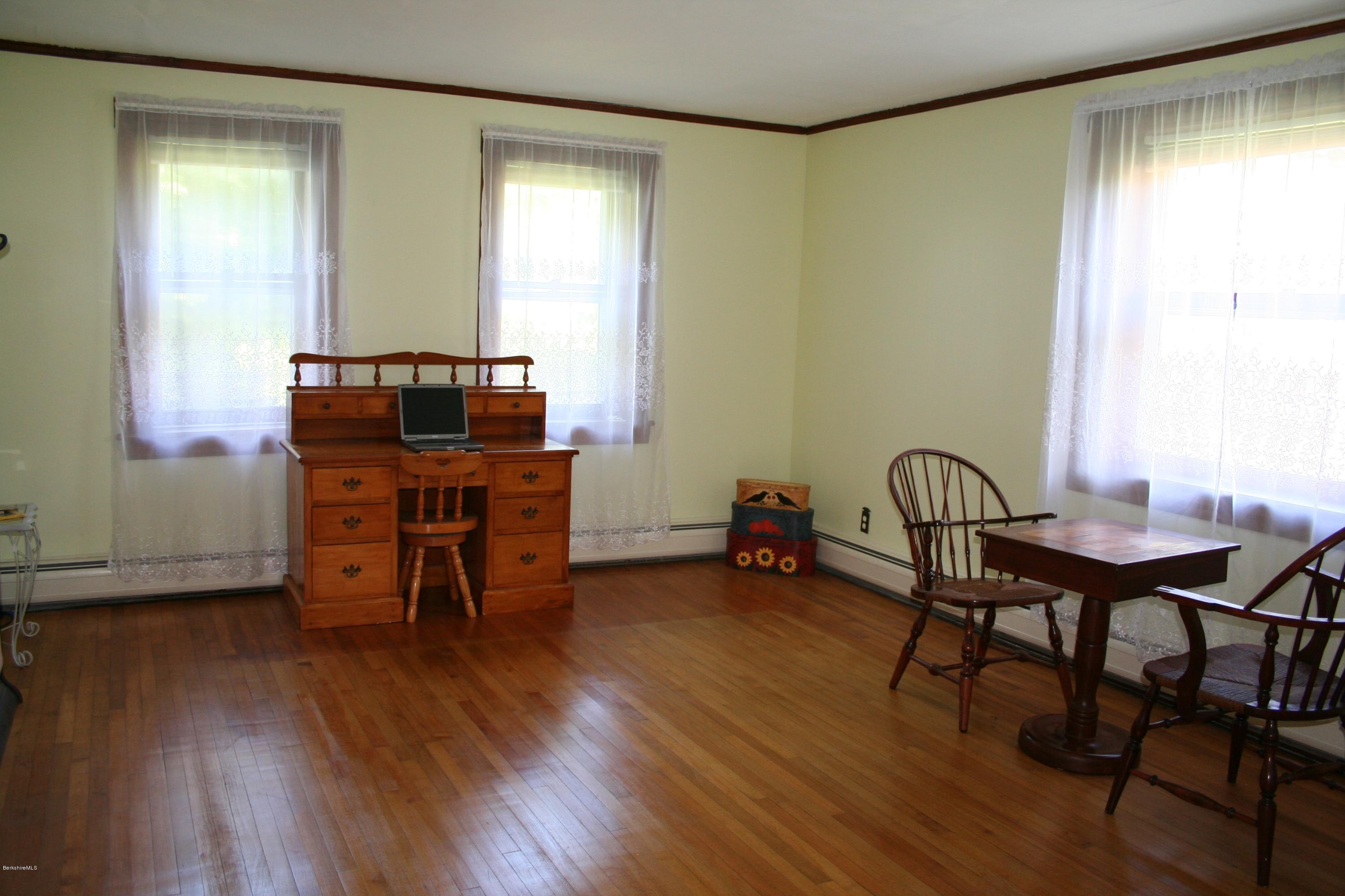 134 West Center Road West Stockbridge, MA 01266 - Photo 14 of 28 a view of a workspace with furniture and a window