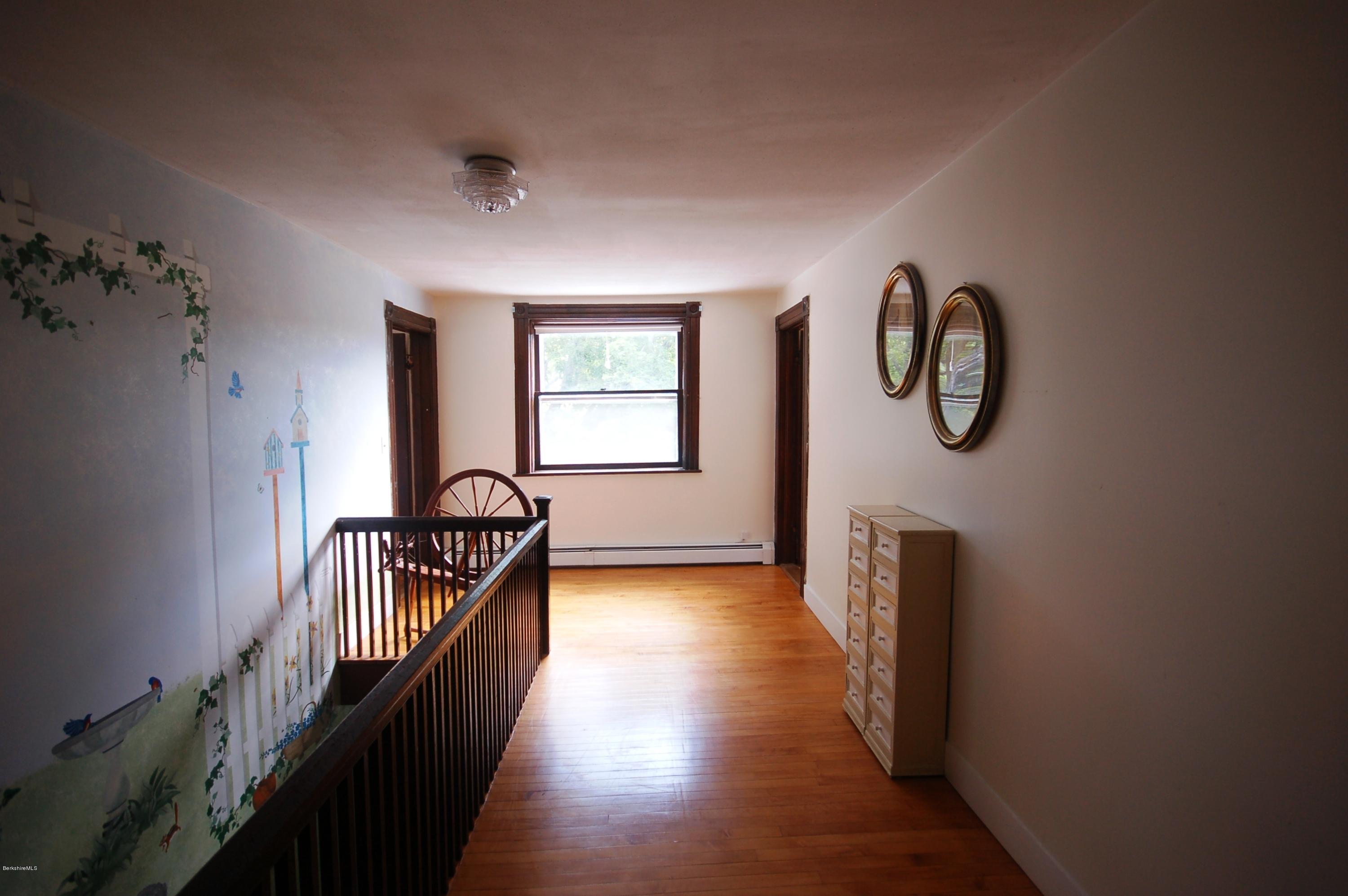134 West Center Road West Stockbridge, MA 01266 - Photo 17 of 28 a view of a hallway with wooden floor and windows