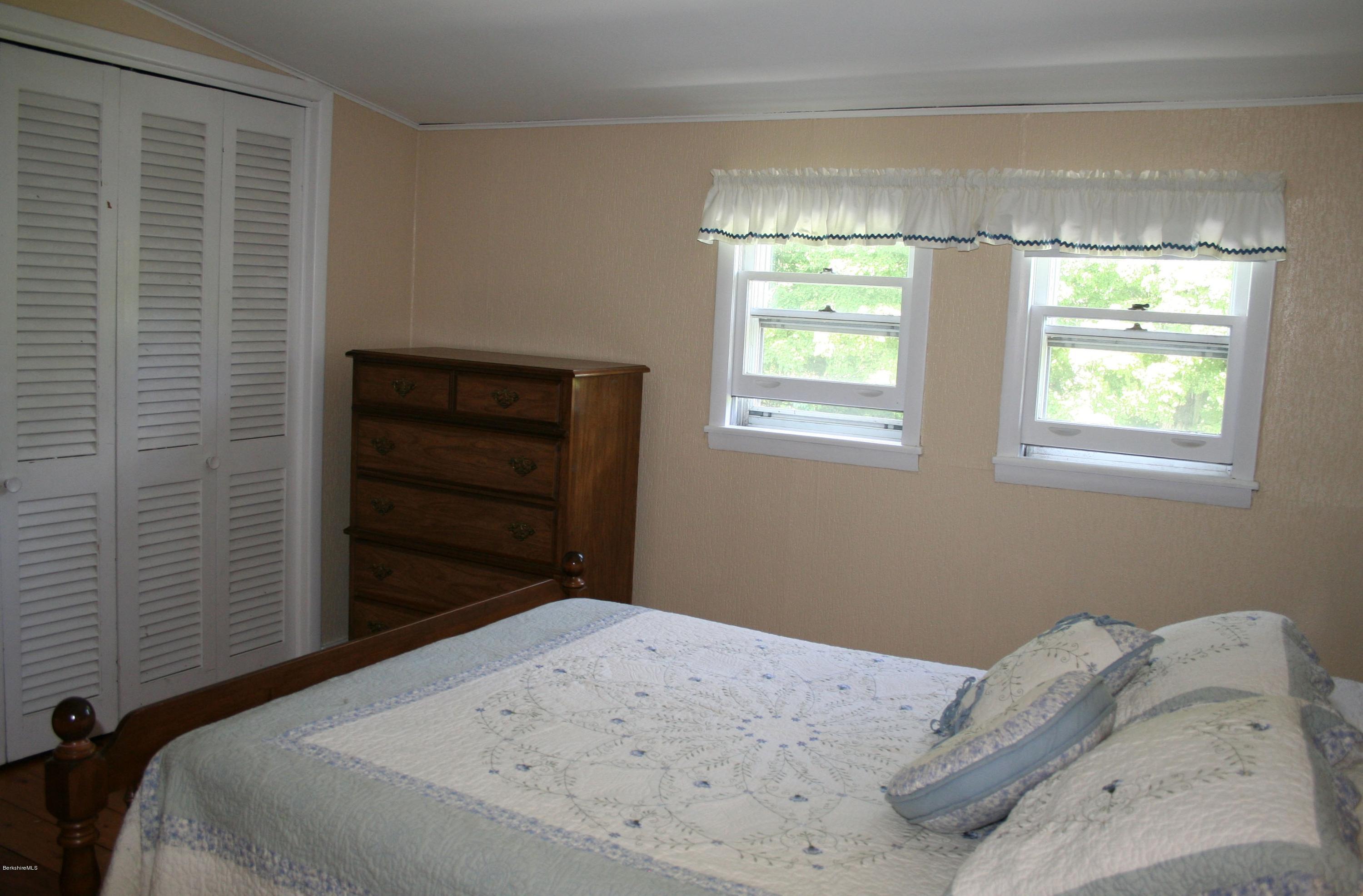 134 West Center Road West Stockbridge, MA 01266 - Photo 22 of 28 a bedroom with a bed and a window