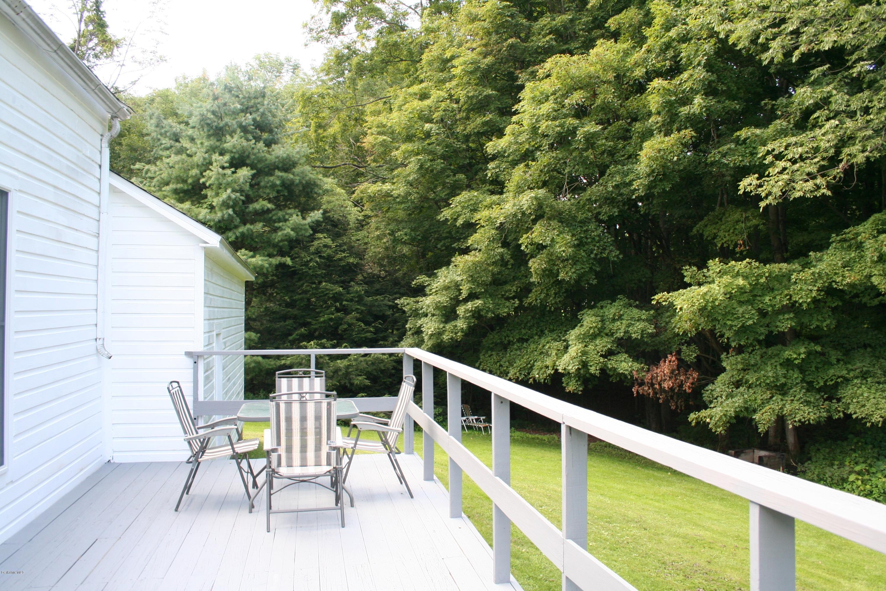 134 West Center Road West Stockbridge, MA 01266 - Photo 23 of 28 a balcony with wooden floor and outdoor space