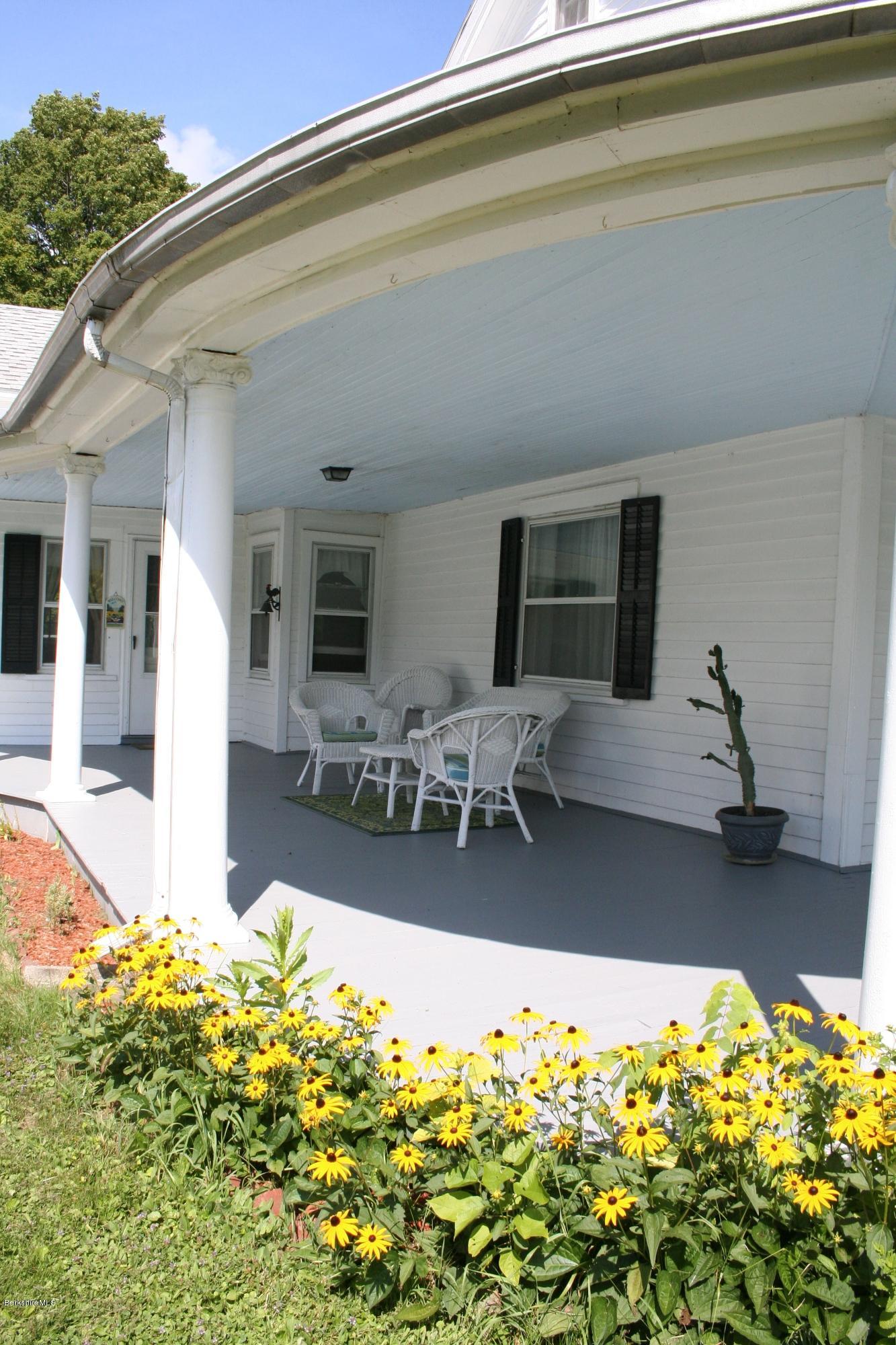 134 West Center Road West Stockbridge, MA 01266 - Photo 4 of 28 a swimming pool with outdoor seating