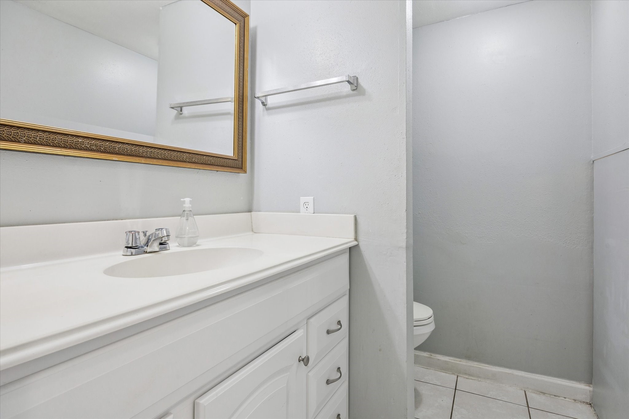 6517 Wanda Lane Houston, TX 77074 - Photo 14 of 29 A good-sized powder room is conveniently located on the first floor next to the stairs.
