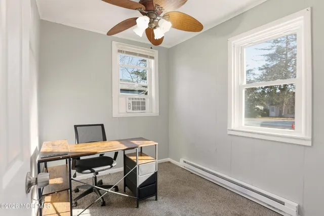 a room that has a bed and a window