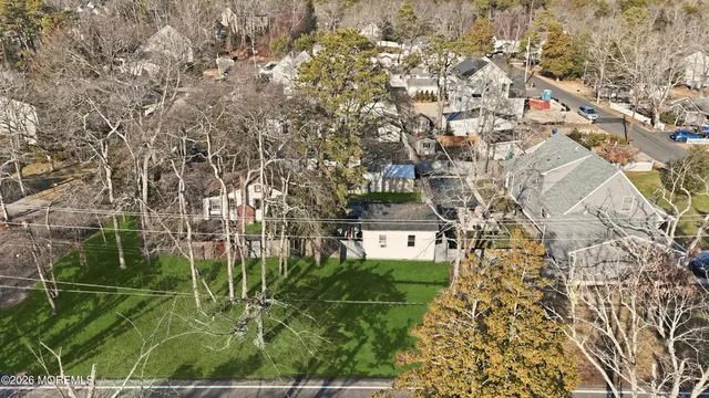 an aerial view of residential house with parking space