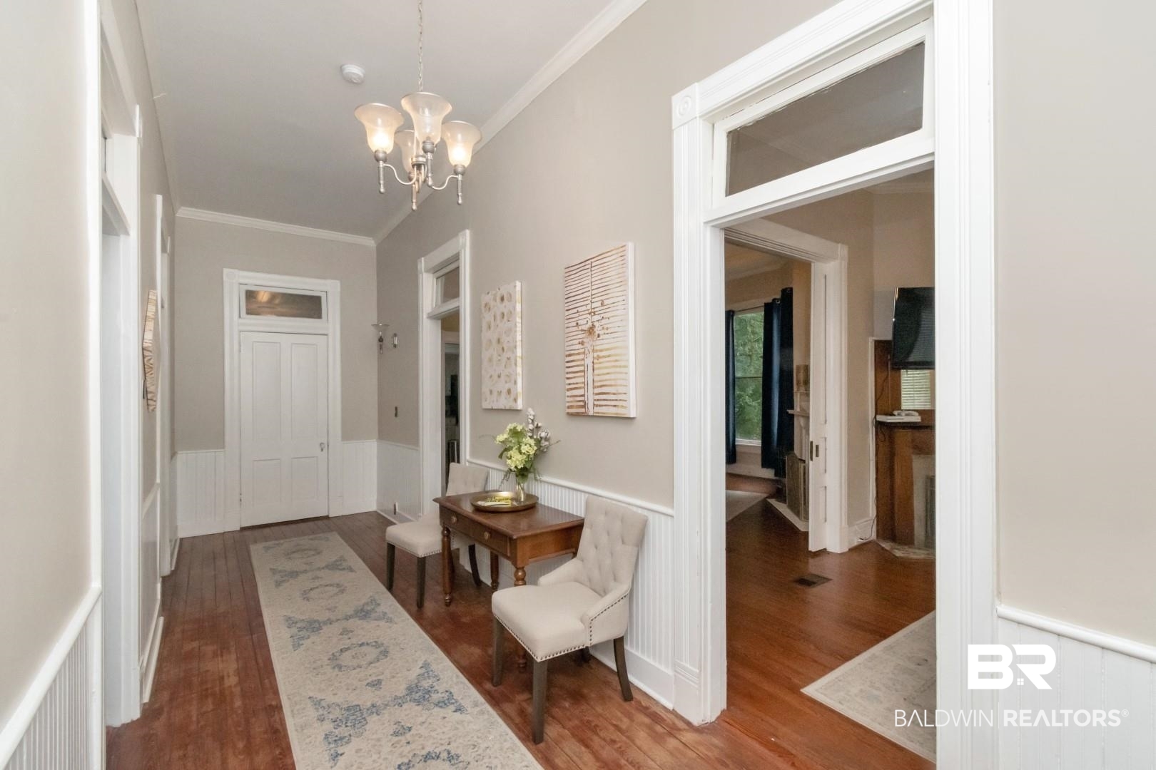 1305 Brown Street Mobile, AL 36604 - Photo 6 of 37 Entryway with ornamental molding, hardwood / wood-style flooring, and an inviting chandelier