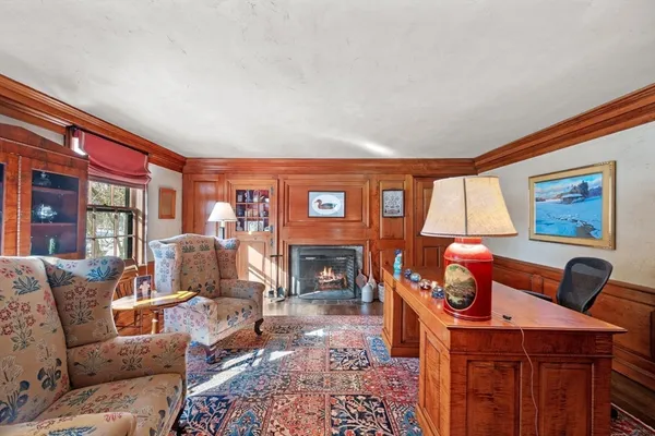 a bedroom with a large bed and a large window