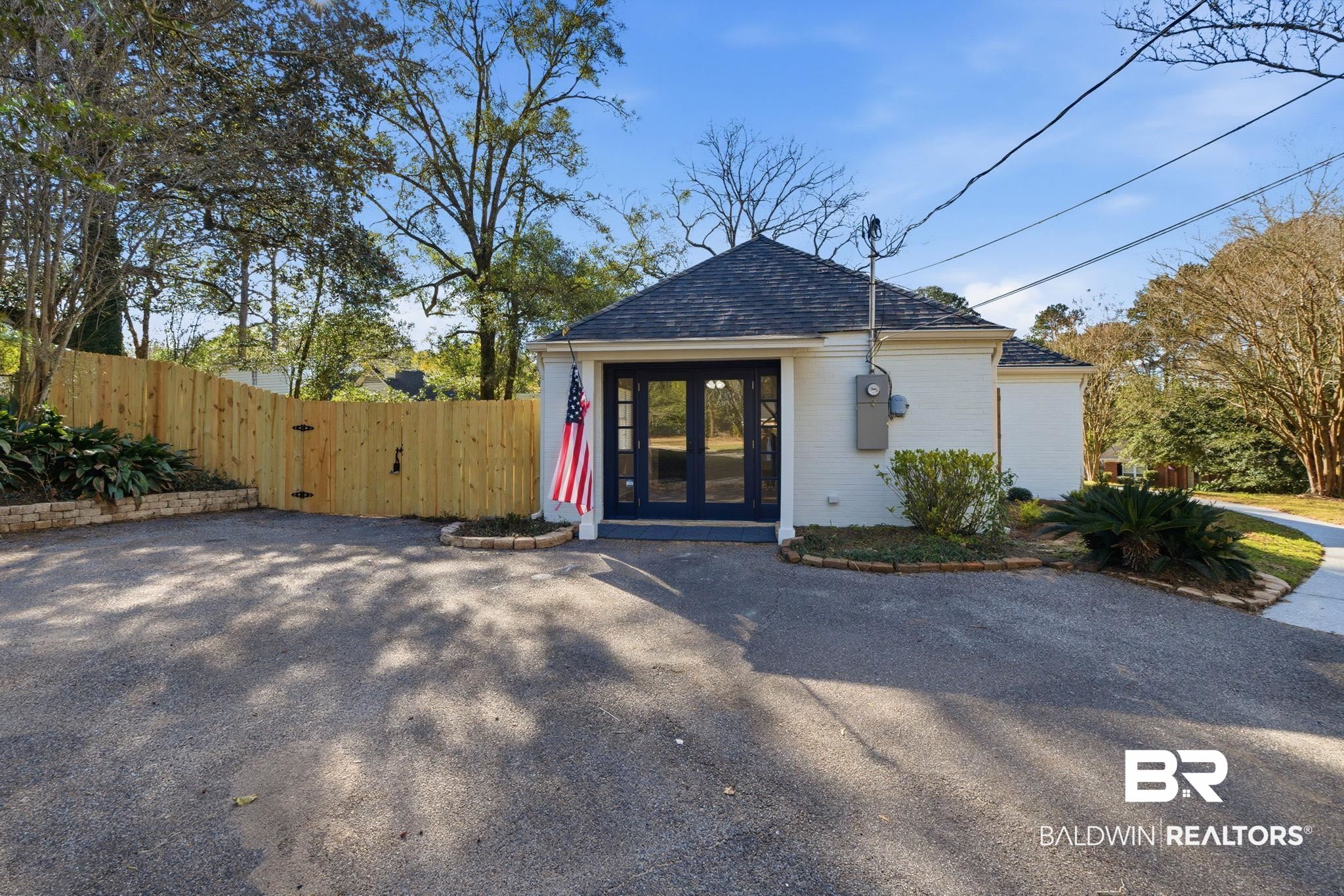 814 Nassau Drive Mobile, AL 36608 - Photo 33 of 44 View of front of property with an outbuilding and roof with shingles