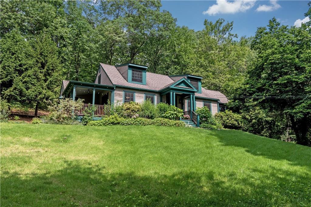 31 Echo Valley Road Newtown, CT 06470 - Photo 1 of 1 a front view of a house with a yard