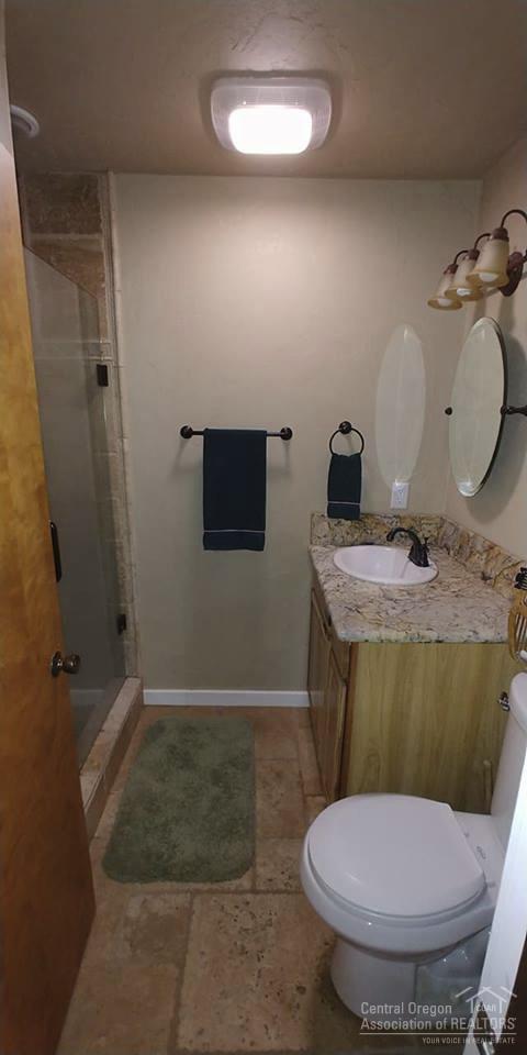 55375 Homestead Way Bend, OR 97707 - Photo 11 of 15 Stylish and updated bathroom with solid