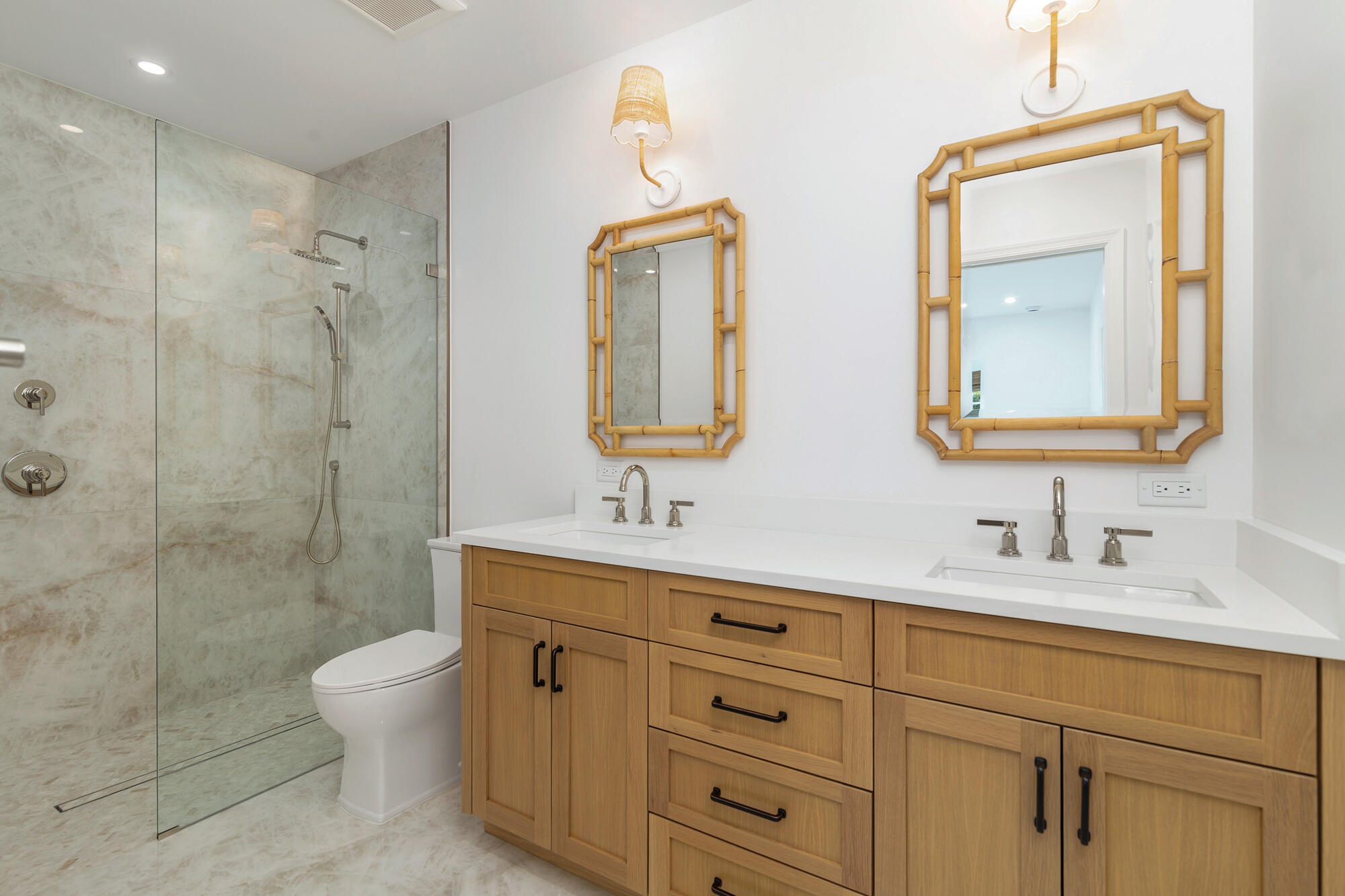 222 South County Road Palm Beach, FL 33480 - Photo 17 of 21 a bathroom with a double vanity sink mirror and toilet