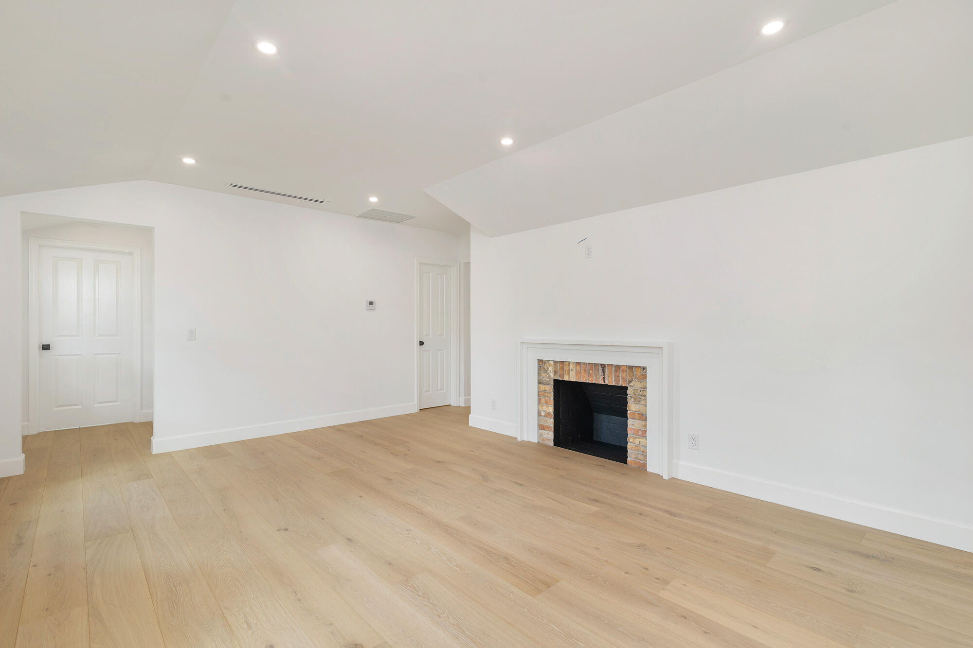 222 South County Road Palm Beach, FL 33480 - Photo 8 of 21 a view of an empty room with a fireplace