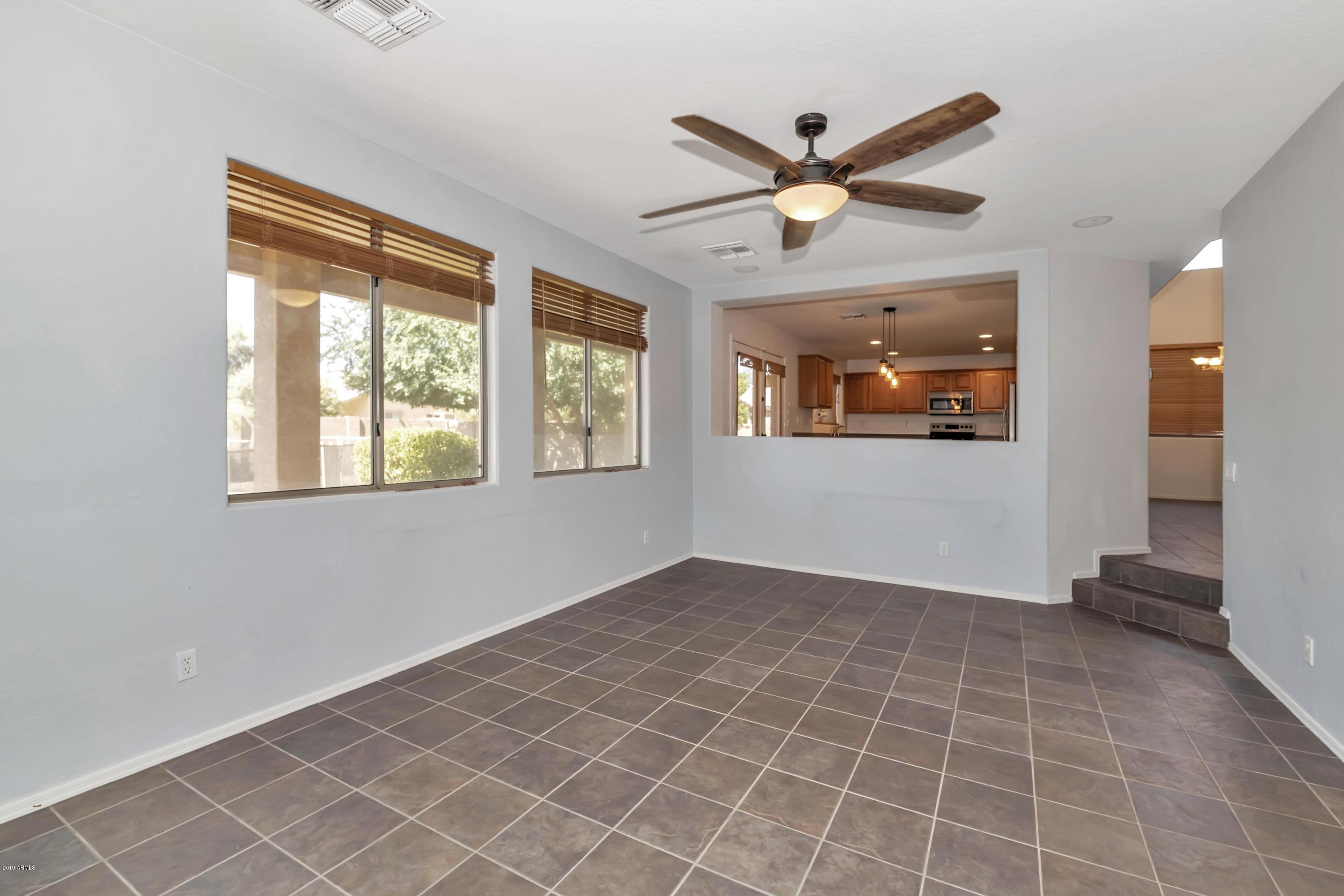 3335 East Chickadee Road Gilbert, AZ 85297 - Photo 14 of 38 VIEW OF KITCHEN AND BACKYARD