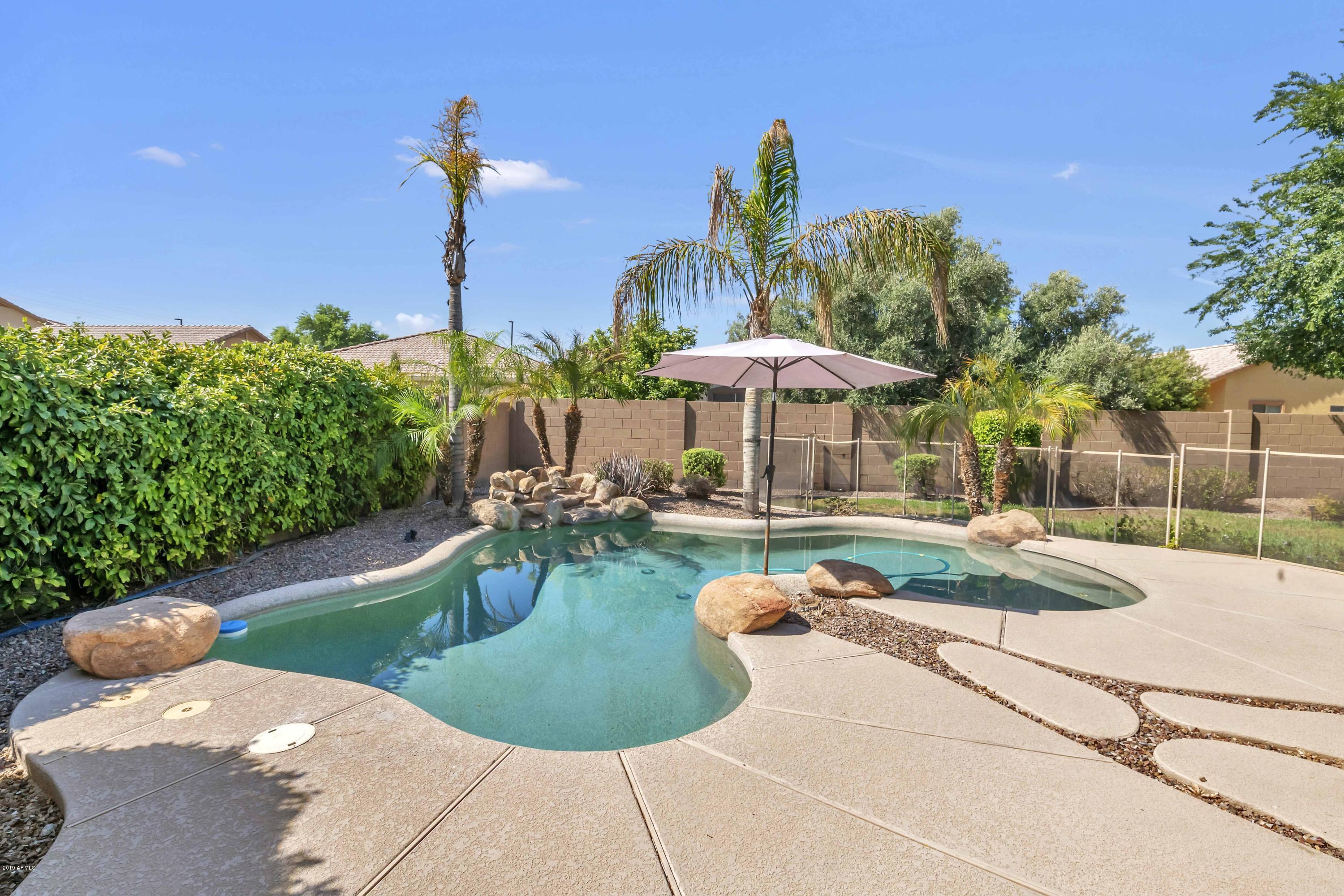3335 East Chickadee Road Gilbert, AZ 85297 - Photo 23 of 38 PEPPLE TEC PLAY POOL W/ WATERFALL