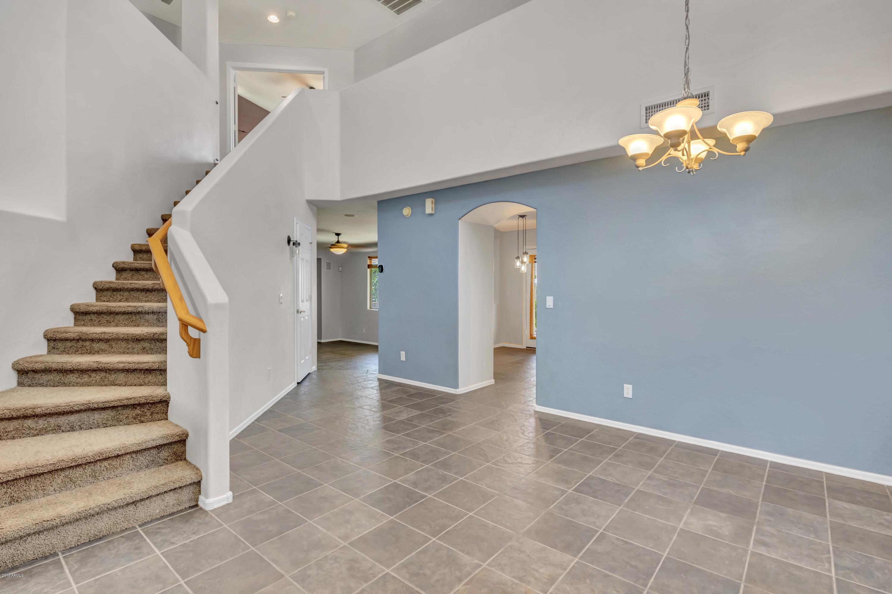 3335 East Chickadee Road Gilbert, AZ 85297 - Photo 8 of 38 FOYER CAN BE DINING OR SITTING ROOM