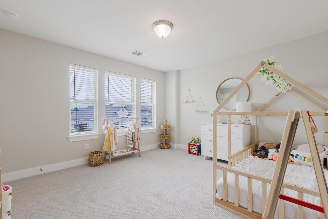 1104 Lickety Lane Georgetown, TX 78633 - Photo 27 of 40 a view of a livingroom with furniture and windows