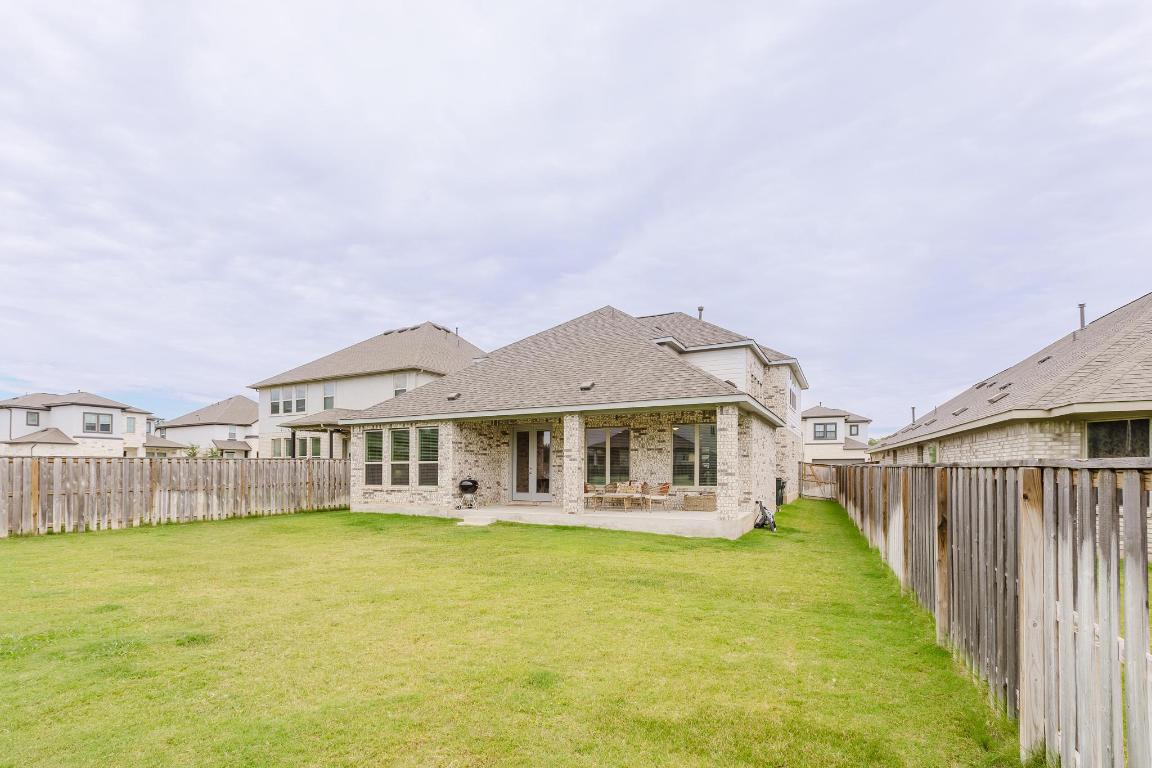 1104 Lickety Lane Georgetown, TX 78633 - Photo 35 of 40 a front view of a house with swimming pool and porch