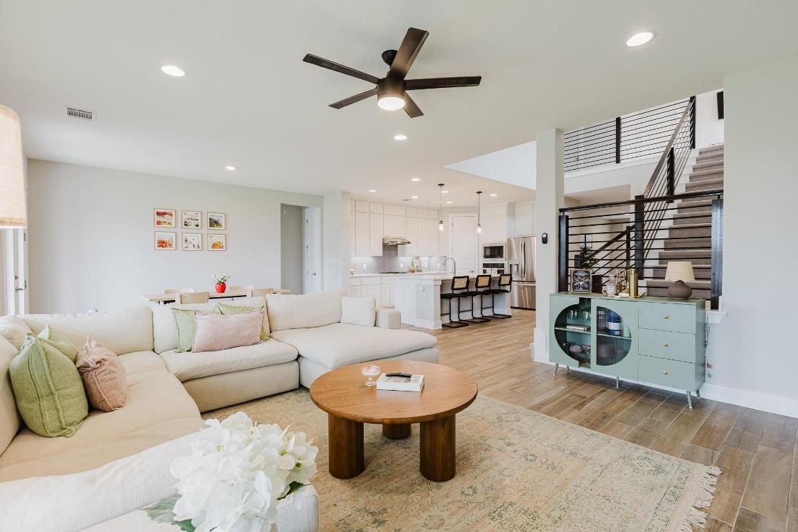 1104 Lickety Lane Georgetown, TX 78633 - Photo 6 of 40 a living room with furniture and a wooden floor