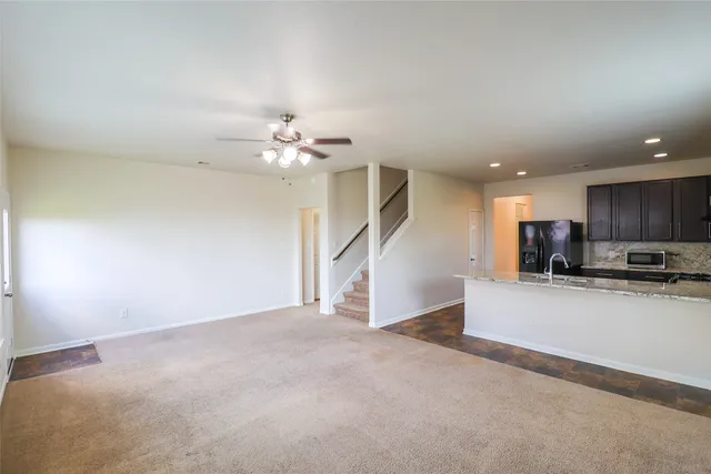 a view of entryway and hall with a window