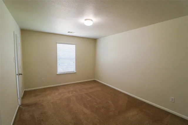 an empty room with an entryway