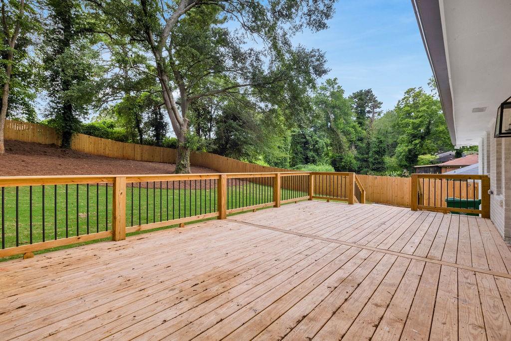 2219 Sharon Way Decatur, GA 30032 - Photo 20 of 23 a view of deck with wooden floor and fence