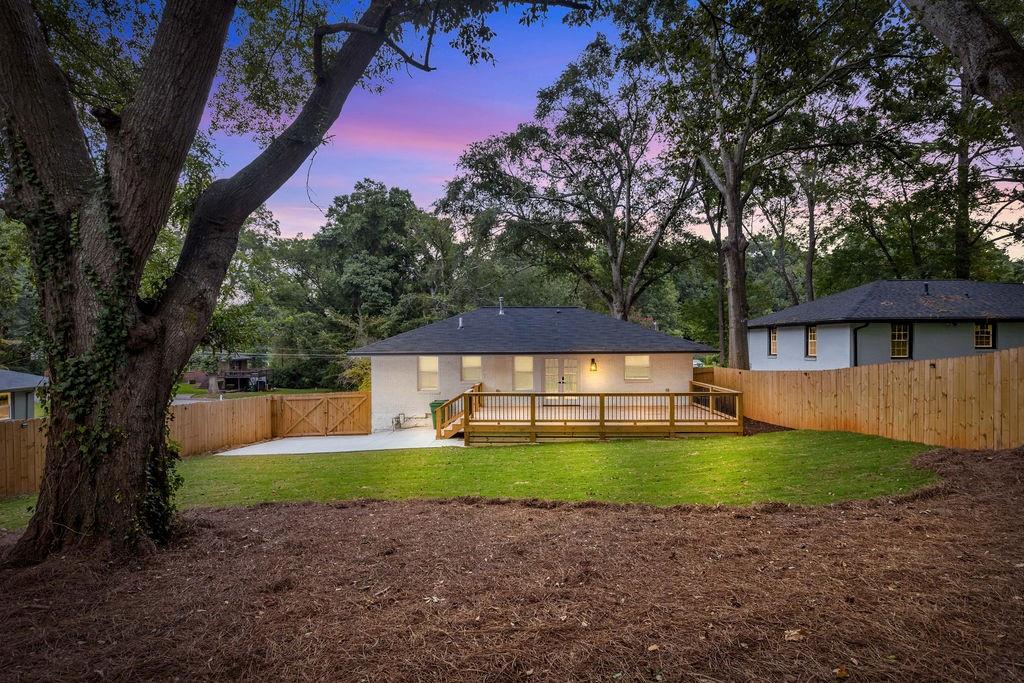 2219 Sharon Way Decatur, GA 30032 - Photo 23 of 23 a house with swimming pool in front of it