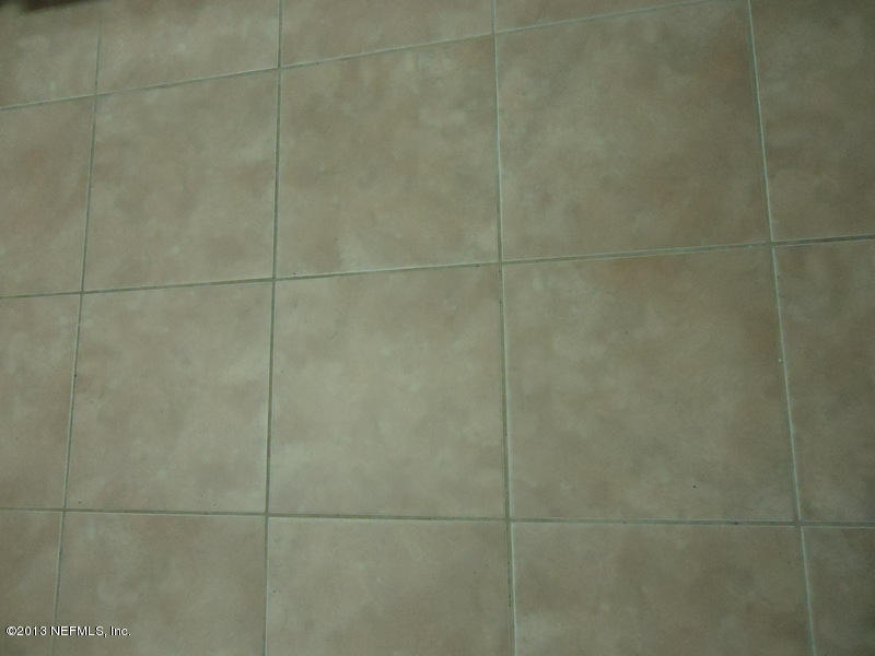 7990 Baymeadows Road East, Unit 1023 Jacksonville, FL 32256 - Photo 13 of 39 a bathroom with a shower