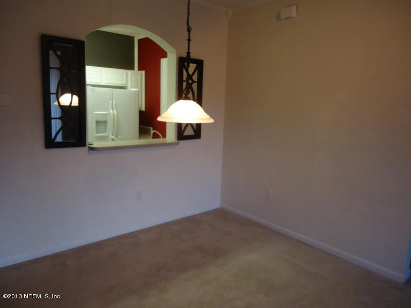 7990 Baymeadows Road East, Unit 1023 Jacksonville, FL 32256 - Photo 15 of 39 an empty room with a bathroom