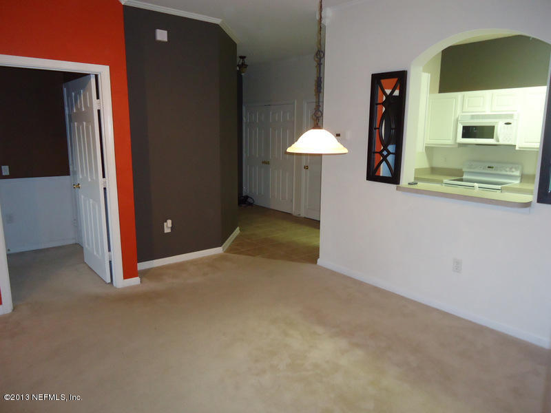 7990 Baymeadows Road East, Unit 1023 Jacksonville, FL 32256 - Photo 39 of 39 an empty room with a bathroom and mirror